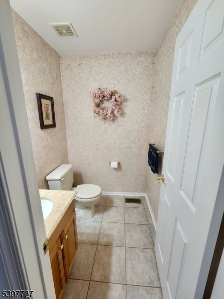 48 Edgefield Drive Morris Plains, NJ 07950 - Photo 18 of 21 a bathroom with a sink and a mirror