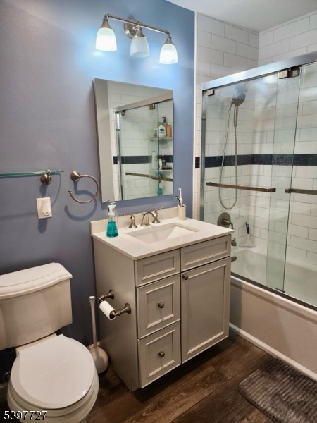 48 Edgefield Drive Morris Plains, NJ 07950 - Photo 20 of 21 a bathroom with a granite countertop toilet sink and mirror
