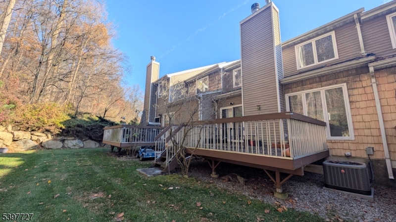 48 Edgefield Drive Morris Plains, NJ 07950 - Photo 21 of 21 a view of a porch with a yard