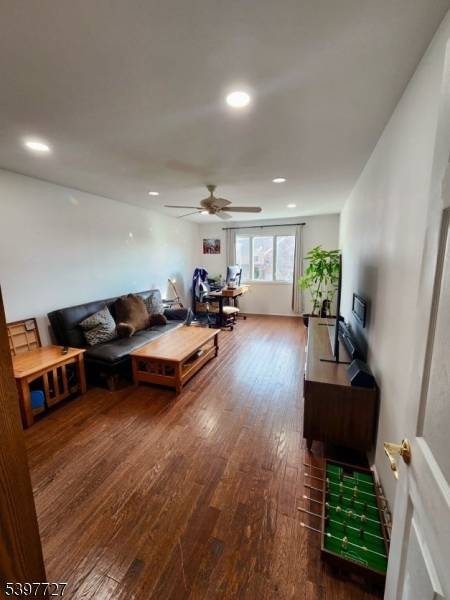 48 Edgefield Drive Morris Plains, NJ 07950 - Photo 3 of 21 a living room with furniture and wooden floor