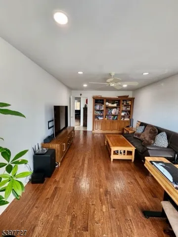 a room with furniture and a wooden floor