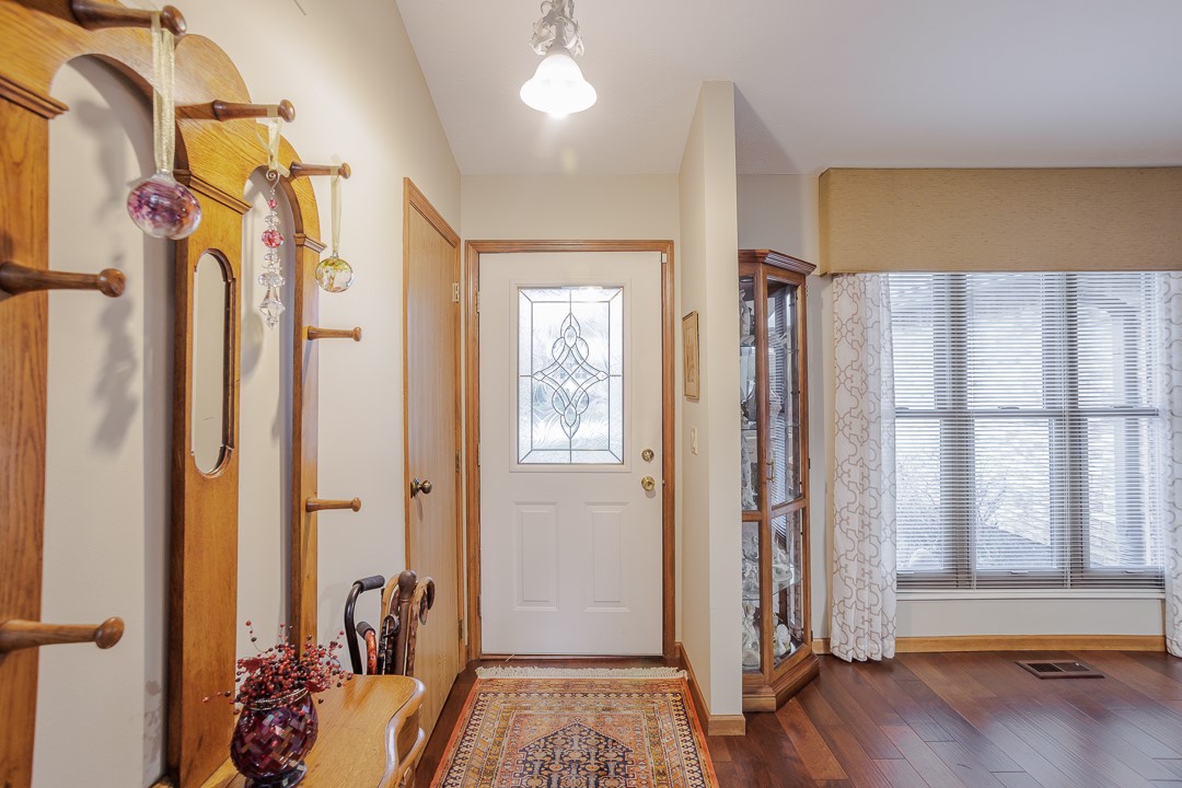 540 Basil Street Springboro, OH 45066 - Photo 2 of 32 The inviting entryway features rich hardwood flooring and abundant natural light.