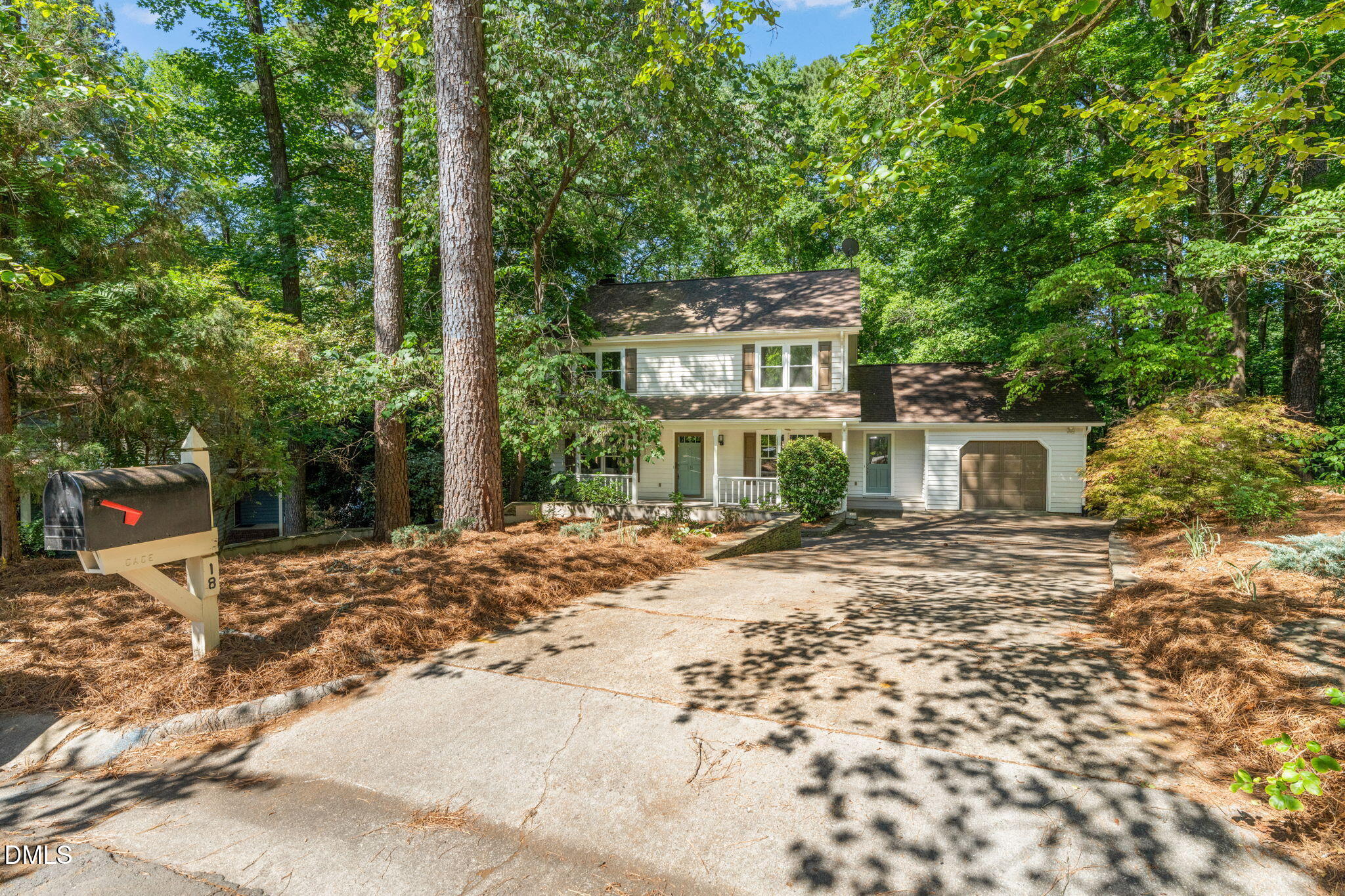 18 Strawberry Ridge Lane Durham, NC 27713 - Photo 52 of 59 a front view of a house with a yard