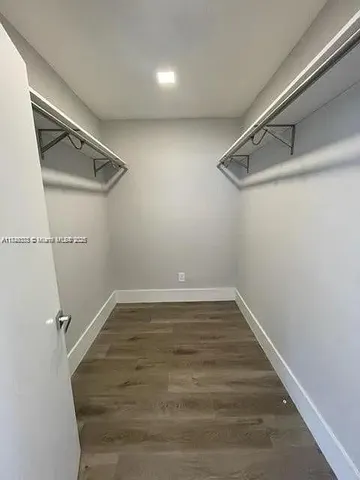 a view of a room with racks on the wall