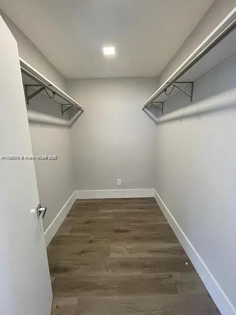 2710 Southwest 31st Avenue Miami, FL 33133 - Photo 20 of 29 a view of a room with racks on the wall