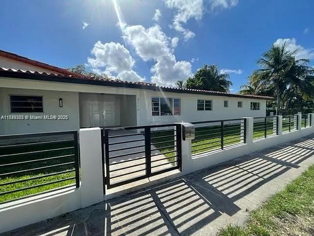 2710 Southwest 31st Avenue Miami, FL 33133 - Photo 2 of 29 a view of a balcony with wooden floor