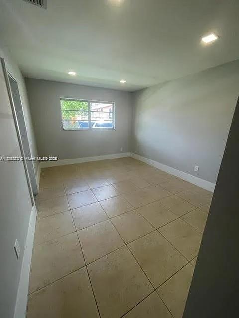 2710 Southwest 31st Avenue Miami, FL 33133 - Photo 23 of 29 a view of an empty room and a window