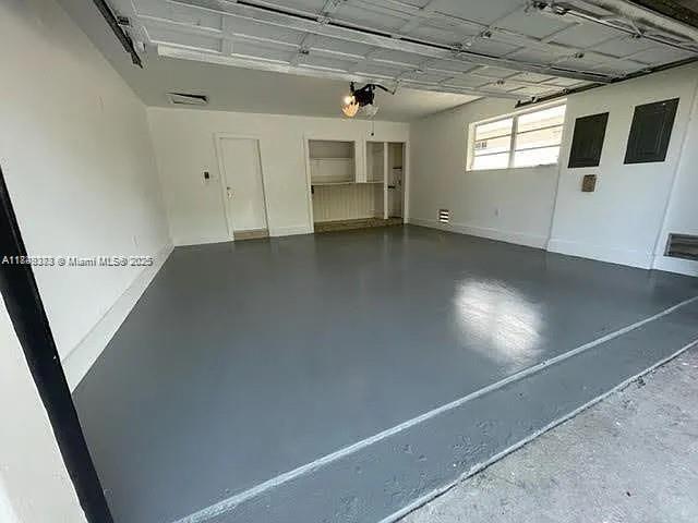 2710 Southwest 31st Avenue Miami, FL 33133 - Photo 28 of 29 a view of a livingroom with an empty space and a window