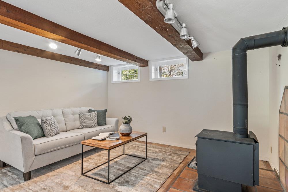 1003 Laurel Glen Road Soquel, CA 95073 - Photo 16 of 115 a living room with furniture and a table