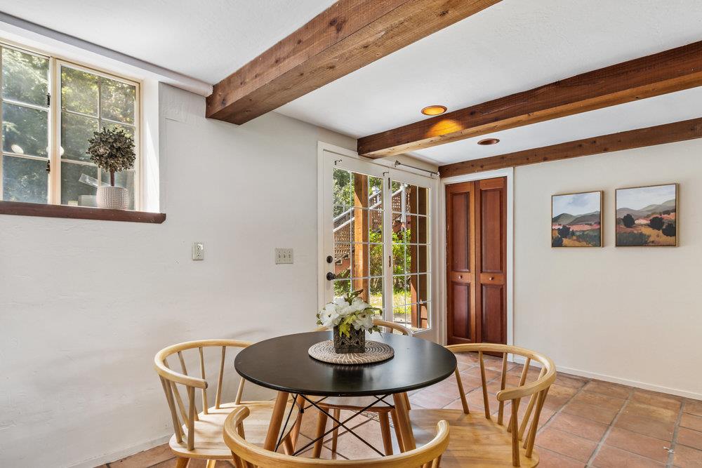 1003 Laurel Glen Road Soquel, CA 95073 - Photo 21 of 115 a view of a dining room with furniture wooden floor and a potted plant