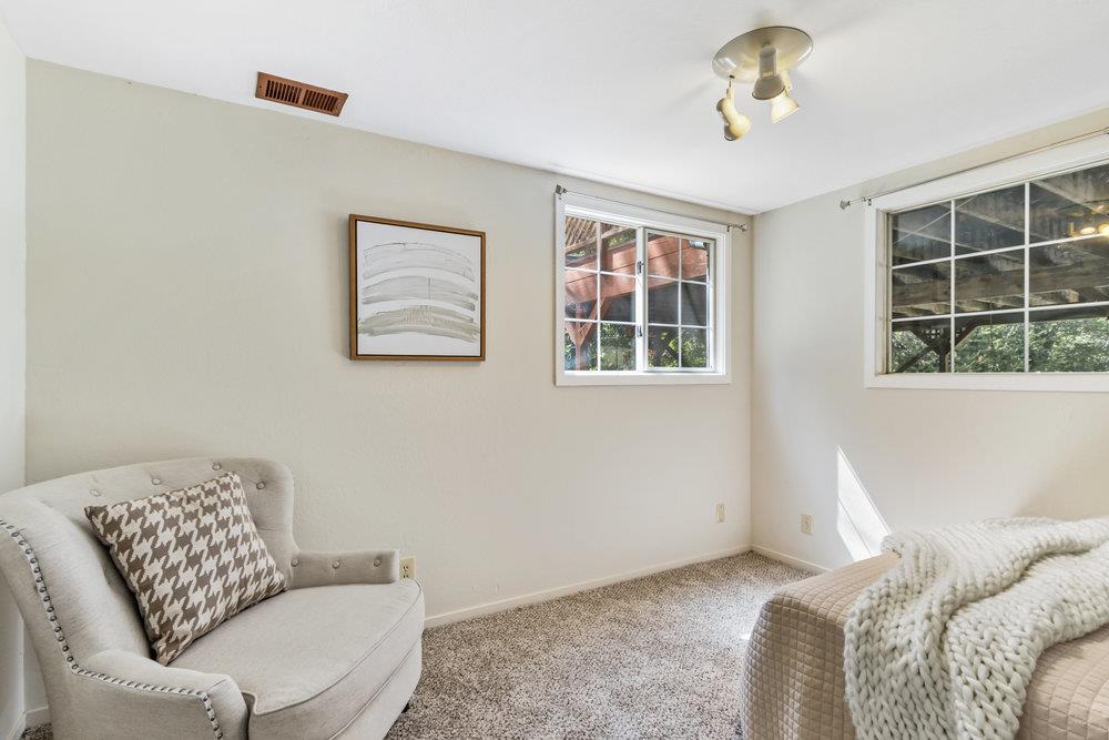 1003 Laurel Glen Road Soquel, CA 95073 - Photo 31 of 115 a living room with furniture and a window