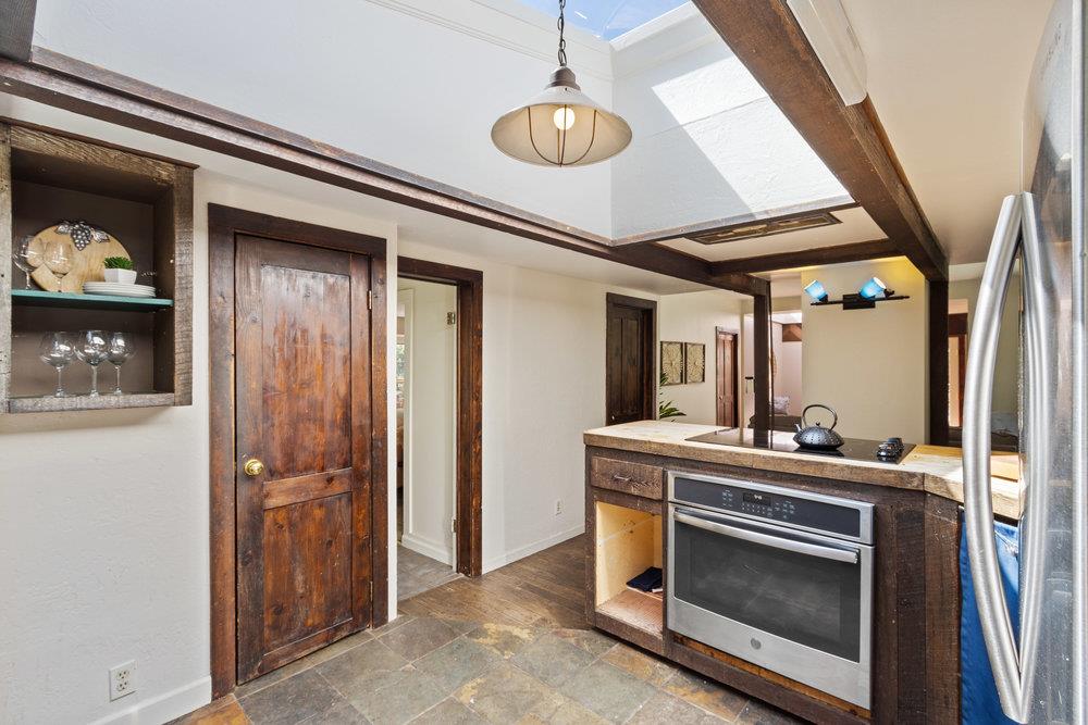 1003 Laurel Glen Road Soquel, CA 95073 - Photo 38 of 115 a kitchen with a stove and a refrigerator
