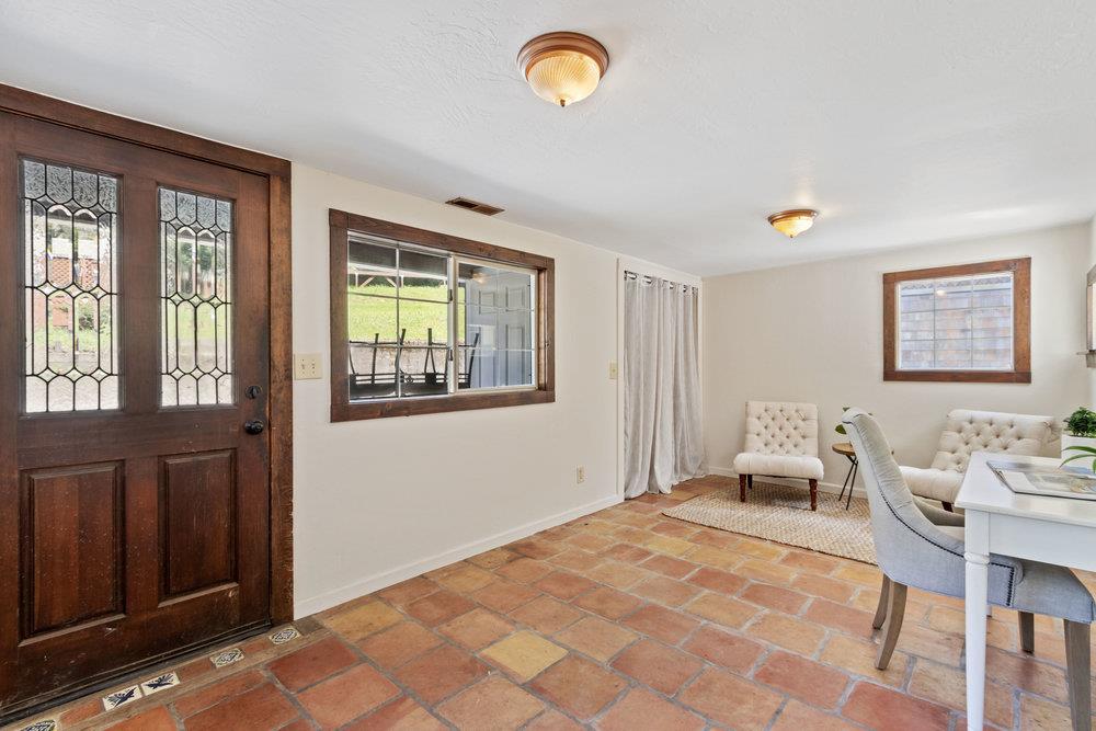 1003 Laurel Glen Road Soquel, CA 95073 - Photo 45 of 115 a bedroom with furniture and a window
