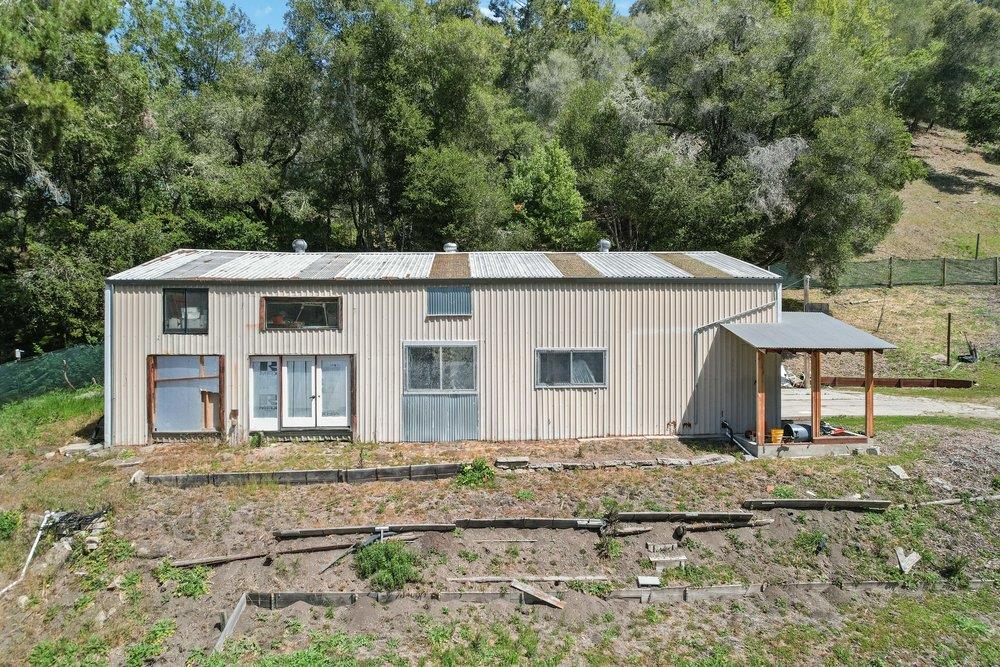 1003 Laurel Glen Road Soquel, CA 95073 - Photo 58 of 115 a house with trees in the background
