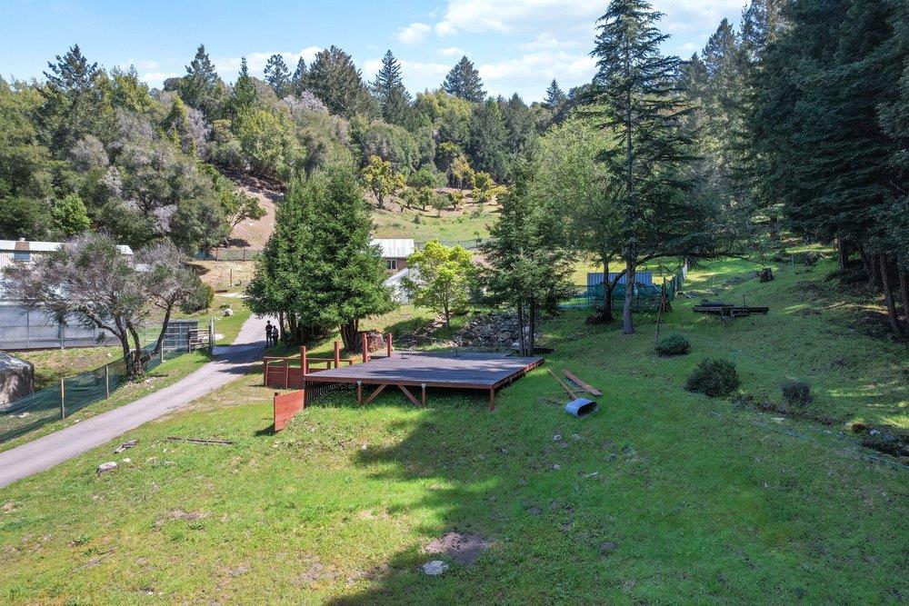 1003 Laurel Glen Road Soquel, CA 95073 - Photo 67 of 115 a view of a swimming pool with a table and chairs