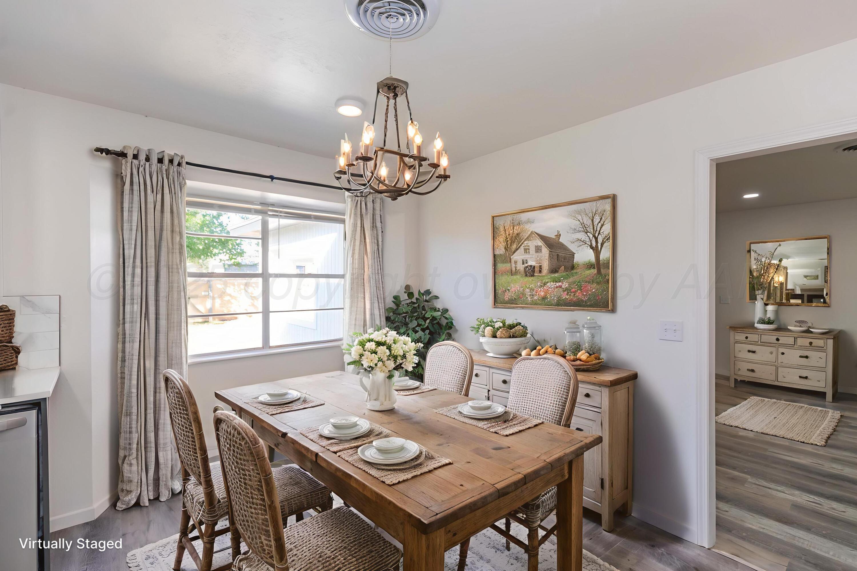 6104 Cornell Street Amarillo, TX 79109 - Photo 14 of 39 a view of a dining room with furniture window and outside view