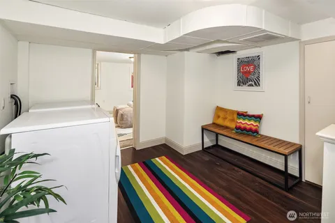 a reading room with furniture and a piano