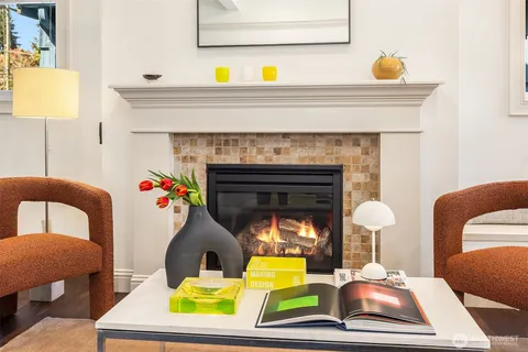 a room with furniture and a fireplace