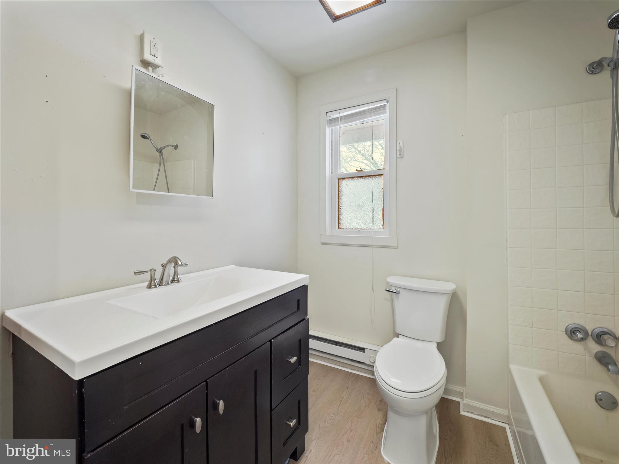 228 Ridge Avenue Waynesboro, PA 17268 - Photo 24 of 32 a bathroom with a sink toilet and vanity