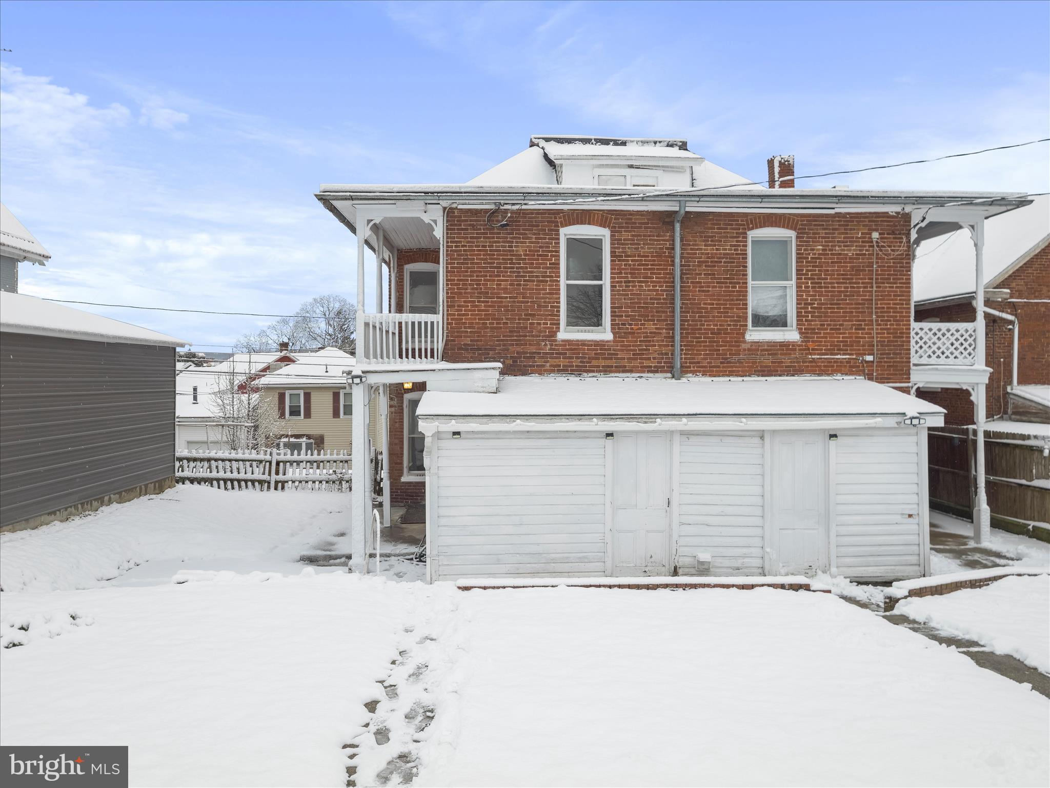 228 Ridge Avenue Waynesboro, PA 17268 - Photo 30 of 32 a tall building with a large parking space in front of it