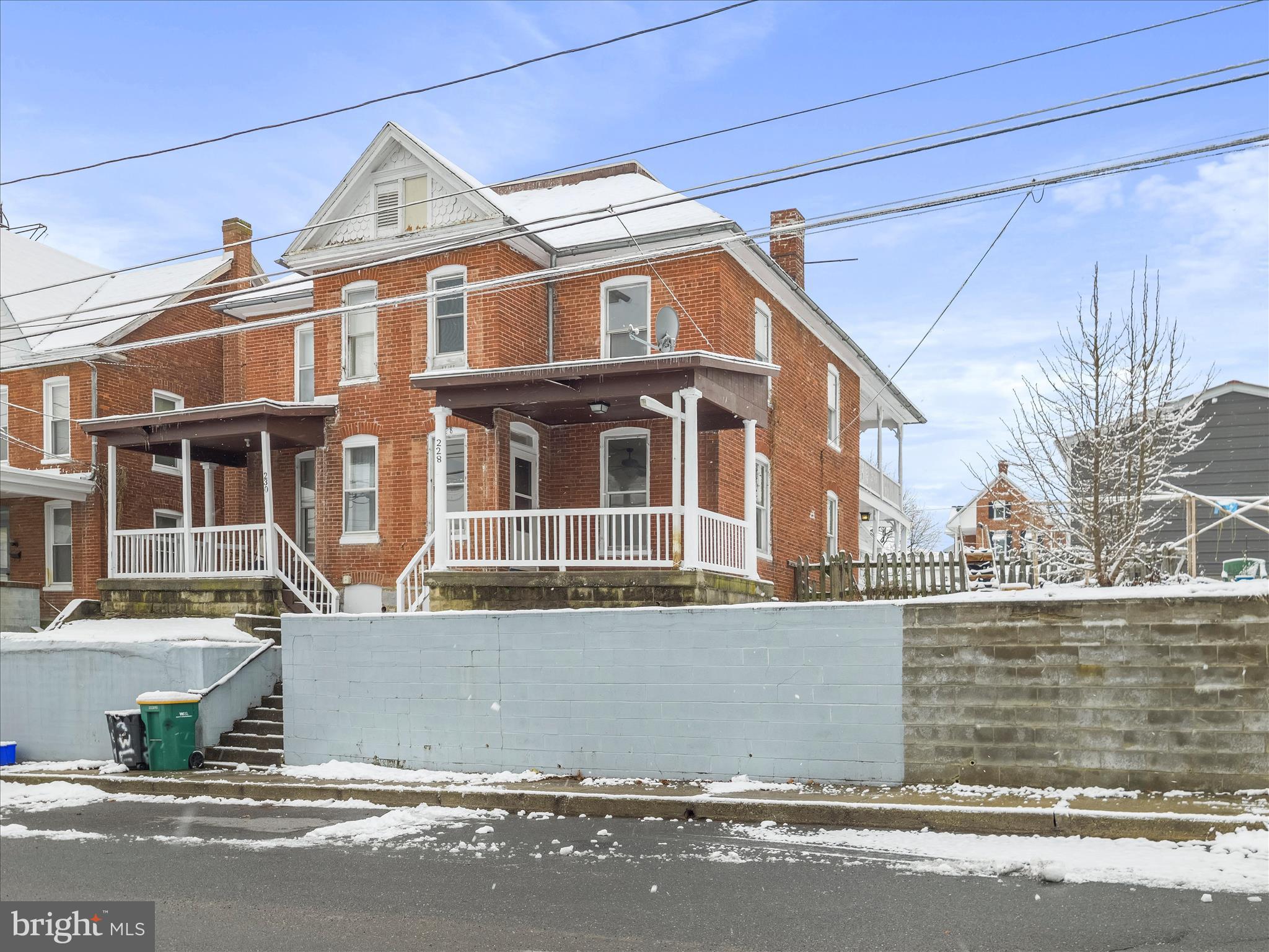 228 Ridge Avenue Waynesboro, PA 17268 - Photo 3 of 32 a front view of a house with a garden