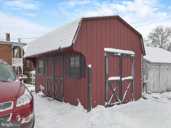 a view of backyard of a house