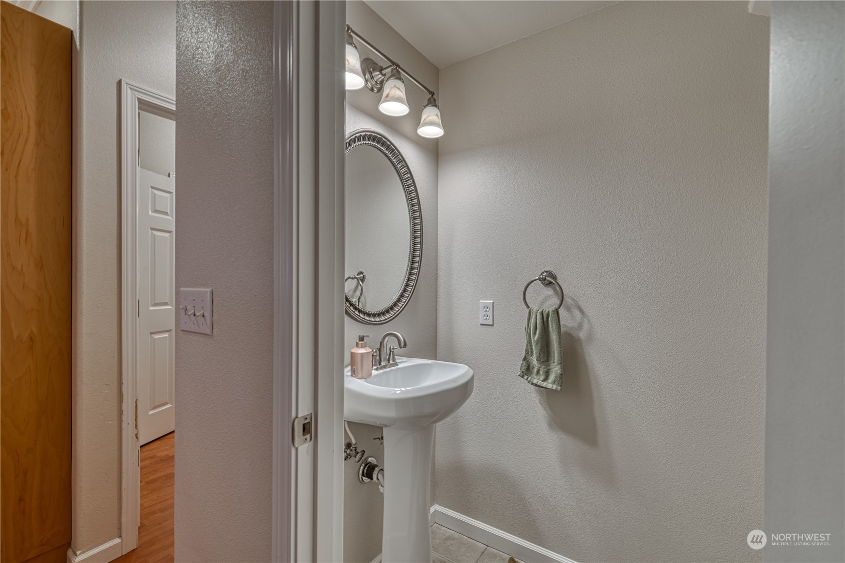 70 Northeast Wagon Wheel Road Belfair, WA 98528 - Photo 12 of 33 a bathroom with a sink toilet and a mirror