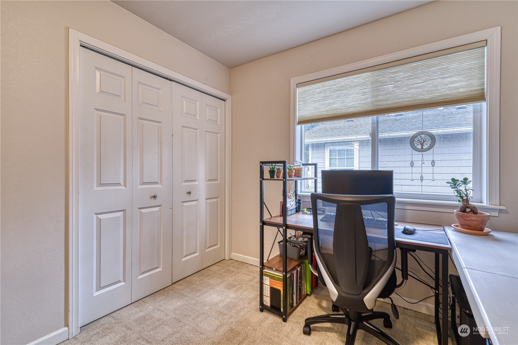70 Northeast Wagon Wheel Road Belfair, WA 98528 - Photo 16 of 33 a view of a workspace with furniture and a window