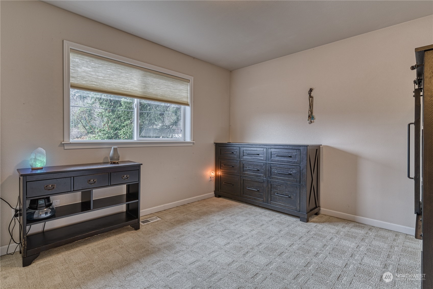 70 Northeast Wagon Wheel Road Belfair, WA 98528 - Photo 17 of 33 a view of an empty room with a window
