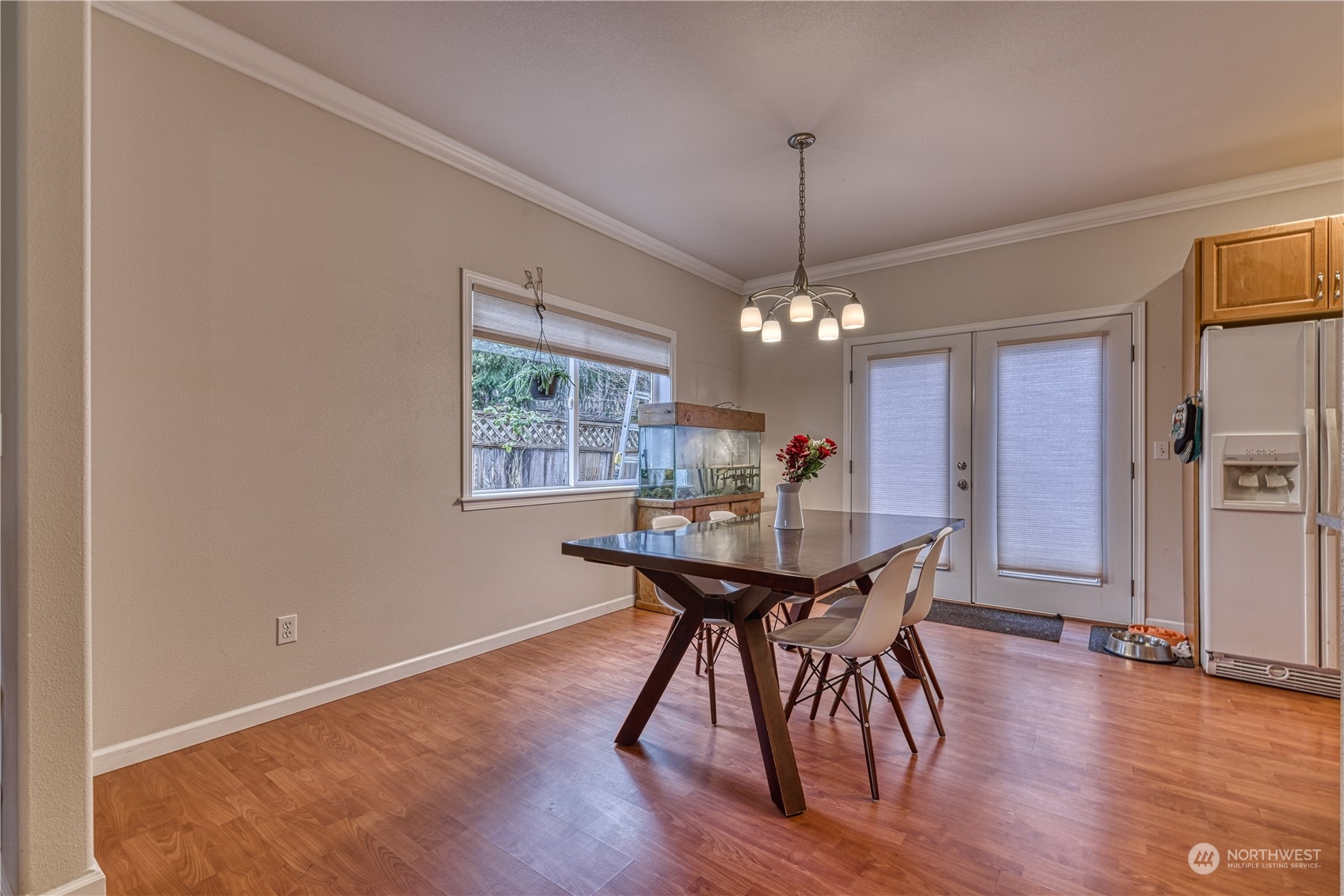 70 Northeast Wagon Wheel Road Belfair, WA 98528 - Photo 6 of 33 a view of a dining room with furniture window and wooden floor