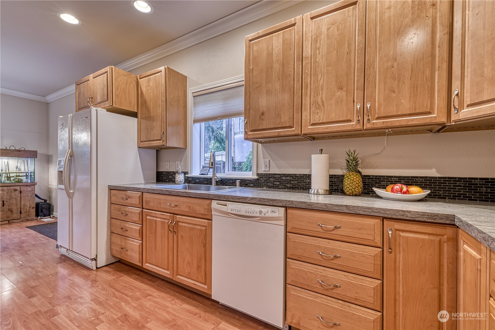 70 Northeast Wagon Wheel Road Belfair, WA 98528 - Photo 8 of 33 a kitchen with granite countertop stainless steel appliances a sink and cabinets
