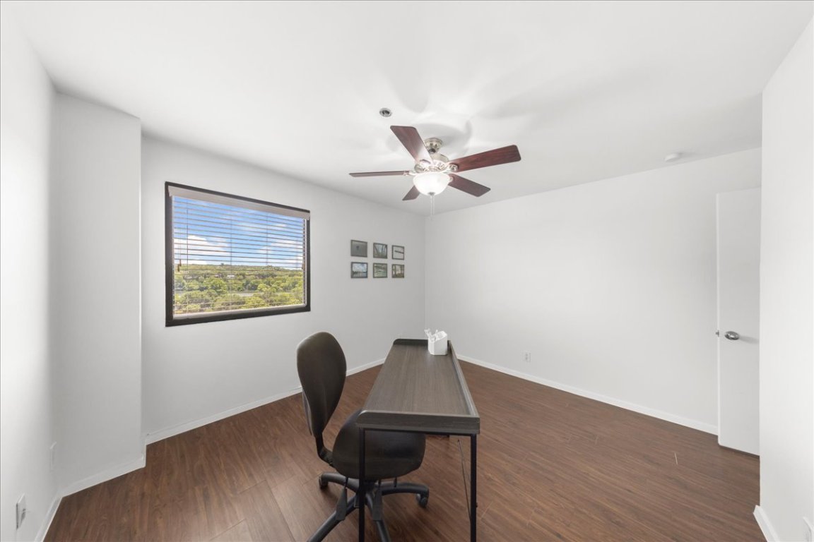 40 North Interstate Highway 35, Unit 6B3 Austin, TX 78701 - Photo 14 of 32 a workspace with furniture and wooden floor