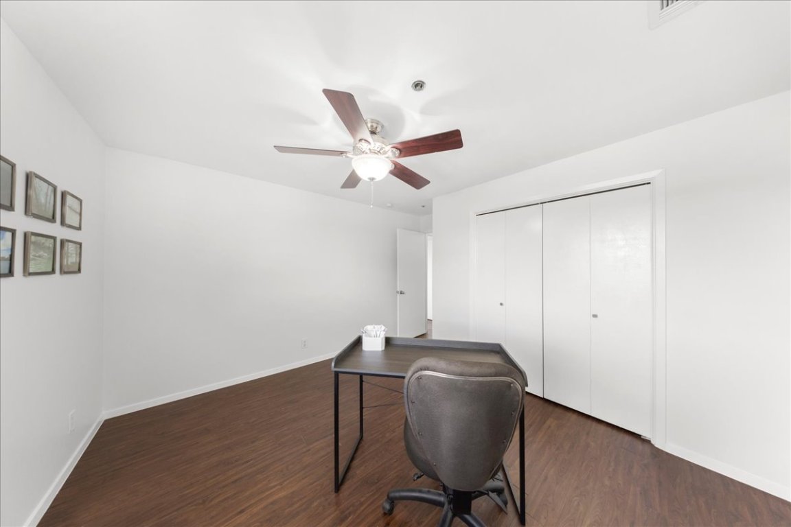 40 North Interstate Highway 35, Unit 6B3 Austin, TX 78701 - Photo 15 of 32 a workspace with furniture and wooden floor