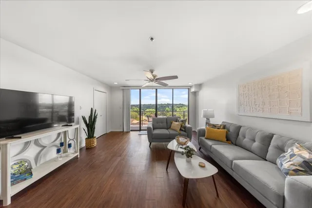 a living room with furniture and a table