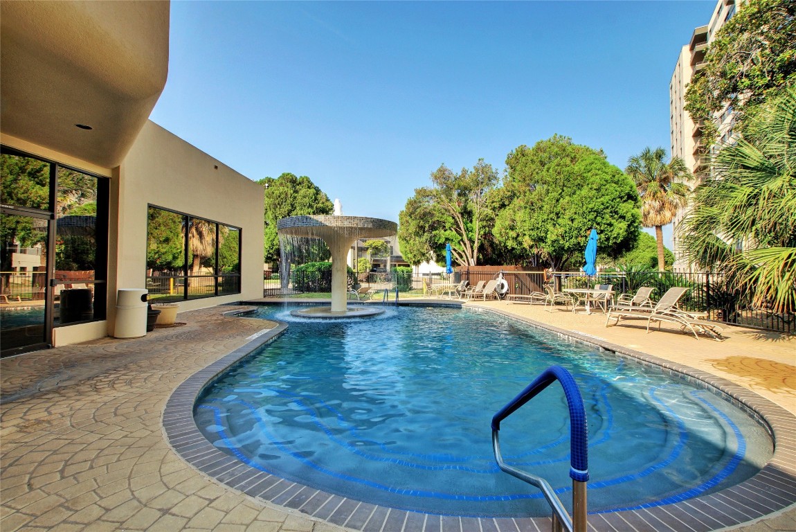 40 North Interstate Highway 35, Unit 6B3 Austin, TX 78701 - Photo 24 of 32 a view of a swimming pool with an outdoor seating