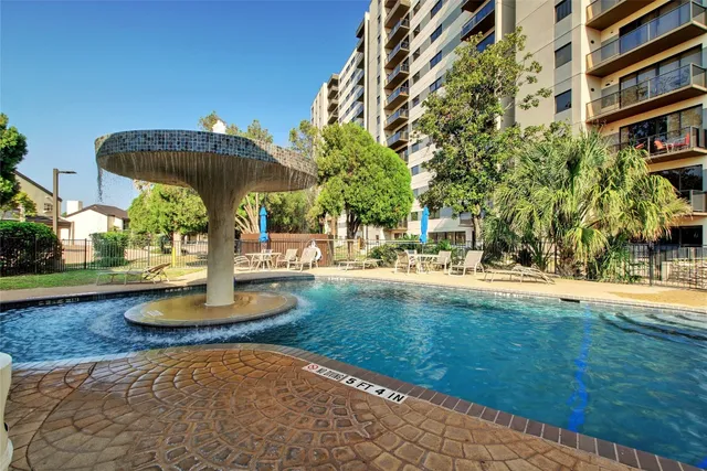 a view of bike storage next to a building