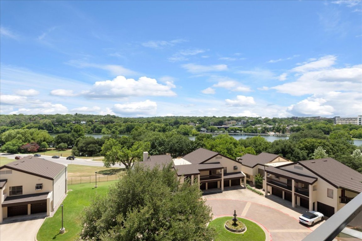 40 North Interstate Highway 35, Unit 6B3 Austin, TX 78701 - Photo 29 of 32 a aerial view of a house with a yard