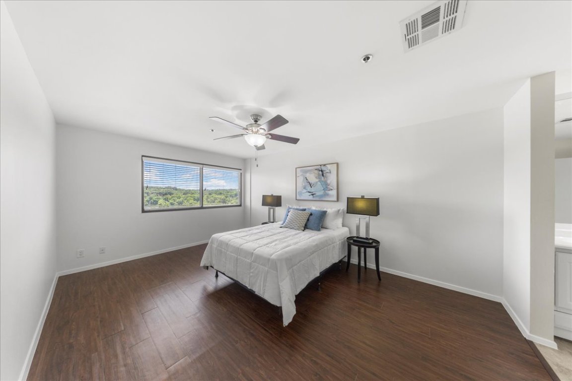 40 North Interstate Highway 35, Unit 6B3 Austin, TX 78701 - Photo 7 of 32 a living room with a bed furniture and a window