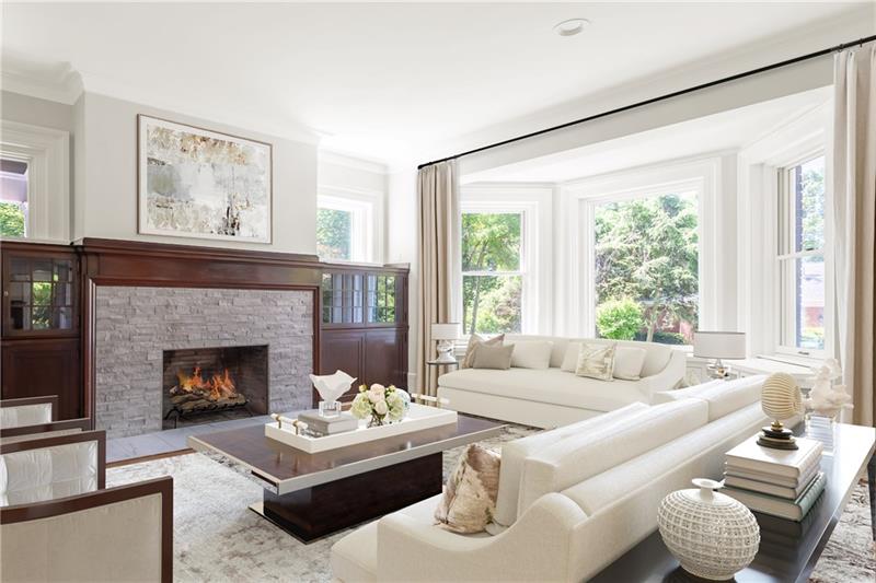 520 Pine Road Sewickley, PA 15143 - Photo 2 of 23 This superb living room offers beautiful, natural light during the day and gorgeous fireplace with custom built-in surround.