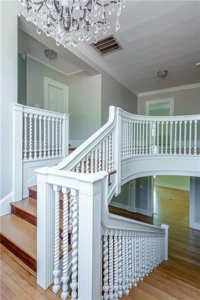 520 Pine Road Sewickley, PA 15143 - Photo 11 of 23 The dramatic staircase graciously leads to the second level.