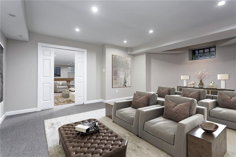 520 Pine Road Sewickley, PA 15143 - Photo 18 of 23 The theater room is adjacent to the game room which has large area for a screen. Pocket doors block out the light, making it a true theater-like experience.