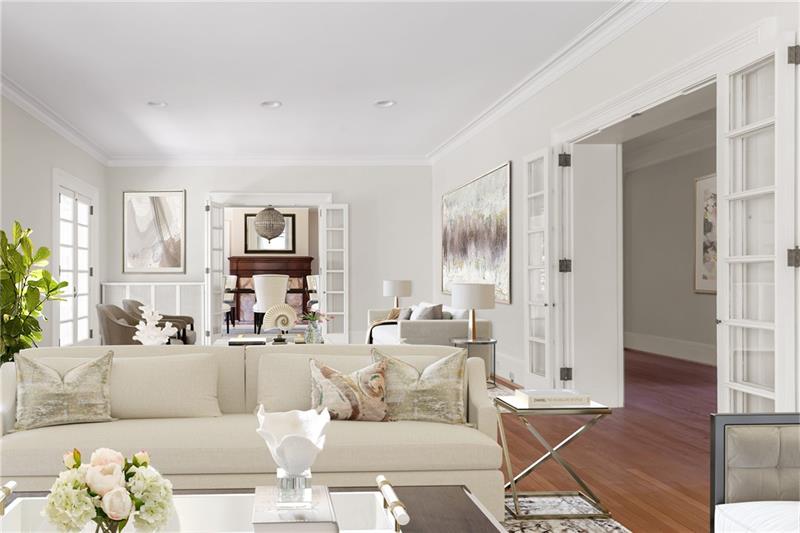 520 Pine Road Sewickley, PA 15143 - Photo 3 of 23 Magnificent living room features bifold French doors to the gracious dining room and also to the entry.