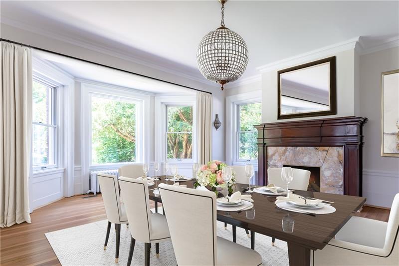 520 Pine Road Sewickley, PA 15143 - Photo 4 of 23 Dining room is perfectly located adjacent to the entry, kitchen and living room. It also features large windows overlooking the lawn and beautiful fireplace.
