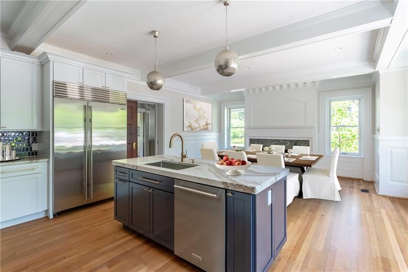 520 Pine Road Sewickley, PA 15143 - Photo 5 of 23 The grand center island is a highlight of the kitchen. The openness of the space is perfect for casual dining or breakfast room.