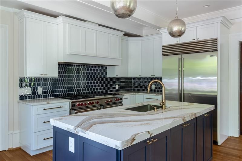 520 Pine Road Sewickley, PA 15143 - Photo 6 of 23 Fabulous kitchen with center island and top-of-the-line appliances.