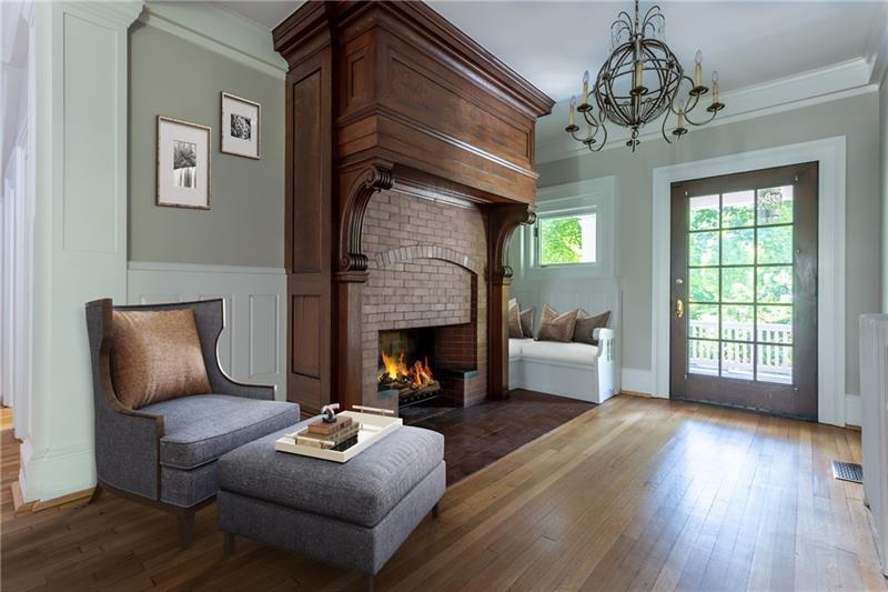 520 Pine Road Sewickley, PA 15143 - Photo 9 of 23 Impressive fireplace and door to the grand back porch.