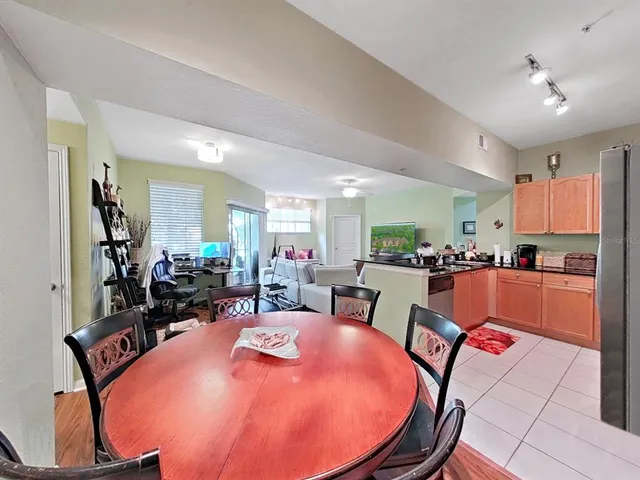 a view of a dining room with furniture