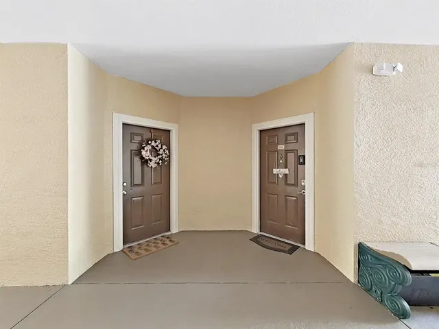 a view of a livingroom with wooden floor and closet