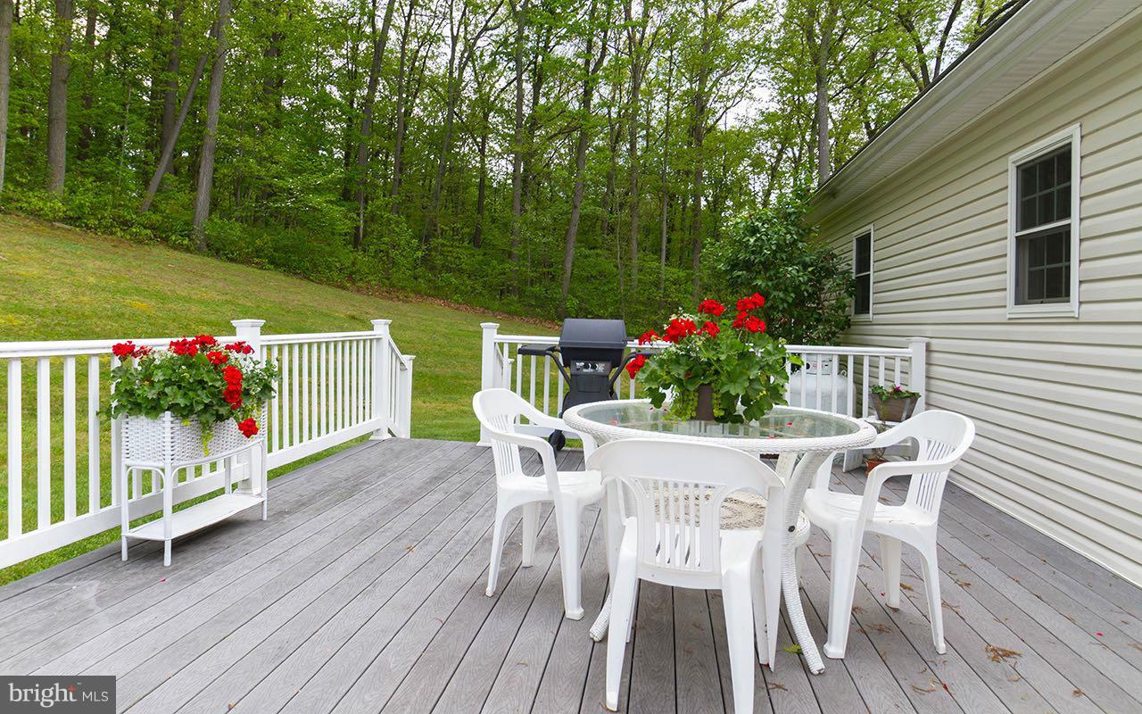 18750 Vernon Road White Hall, MD 21161 - Photo 10 of 30 Rear yard with expansive maintenance free deck