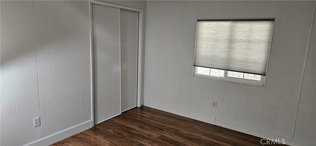 2920 Clark Road, Unit C12 Oroville, CA 95965 - Photo 10 of 17 a view of an empty room with wooden floor and a window